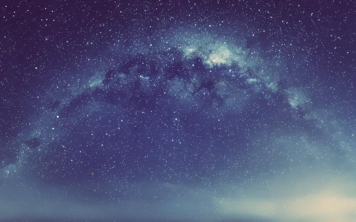 Starry night sky with a nebula