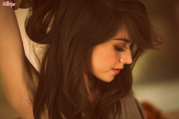 Emily Grey with long dark hair