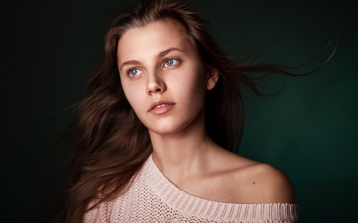 Portrait of a young woman with flowing hair