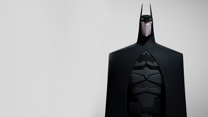 Batman in a stylized black suit with a cape