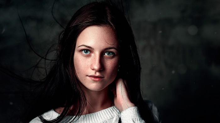 Portrait of a young woman with blue eyes