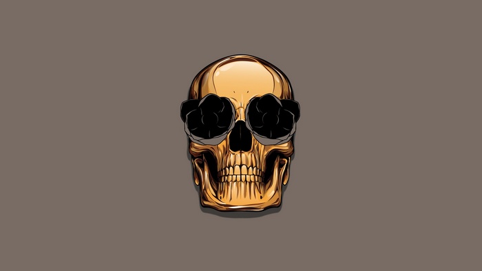 Golden skull with black eye patches