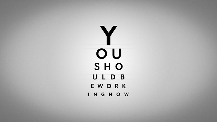 Eye chart with motivational text about work