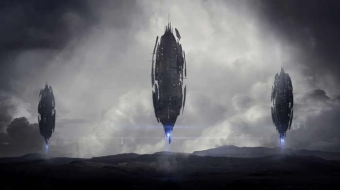 Three alien spacecraft hover over a desolate landscape