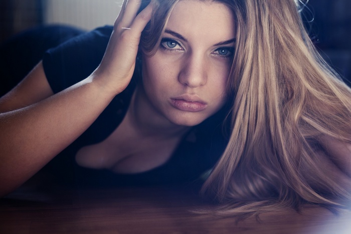 Woman with blonde hair and blue eyes