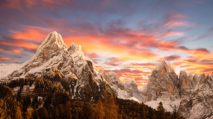 Dolomites mountains at sunset with colorful sky