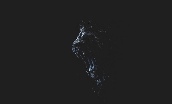 Dark abstract lion head with open mouth