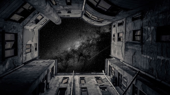 Old building courtyard looking up at the Milky Way