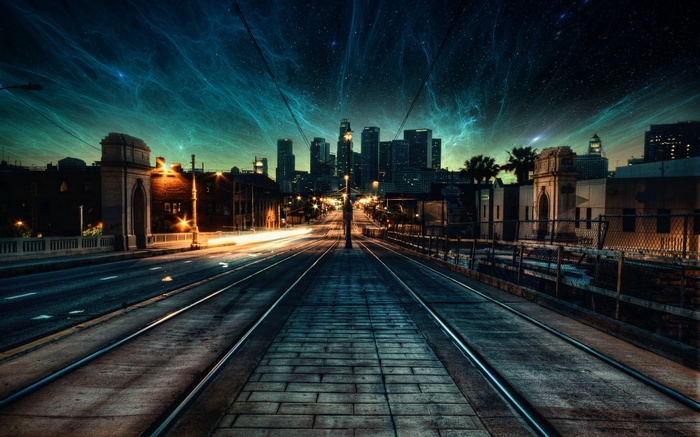 City skyline under a starry nebula sky