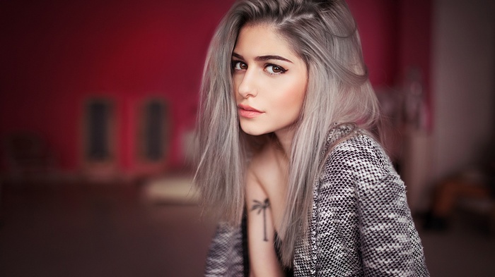 Model with dyed hair and tattoo by Ivan Gorokhov