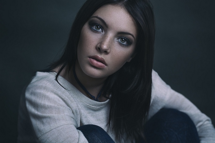 Woman with freckles and dark hair