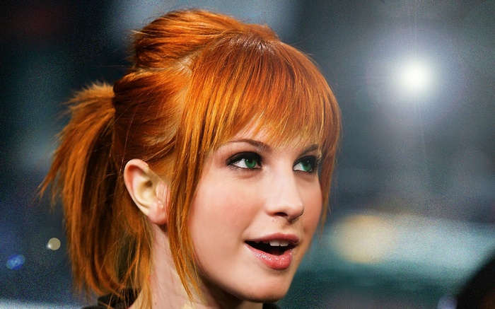 Hayley Williams of Paramore with red hair and green eyes