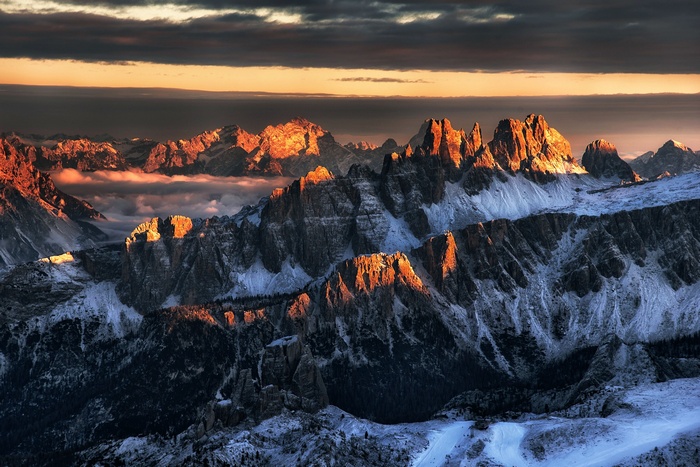 Snow-covered mountains at sunset