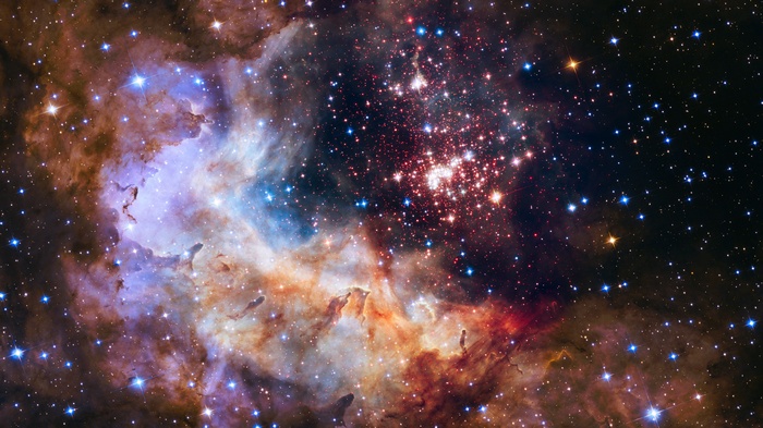 A colorful nebula filled with stars and cosmic dust