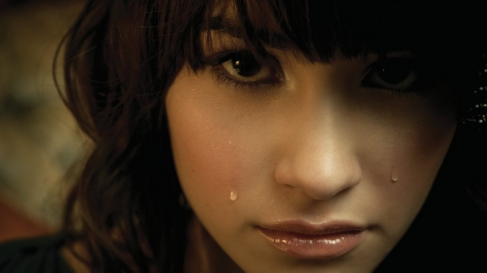 Demi Lovato with tears on her face