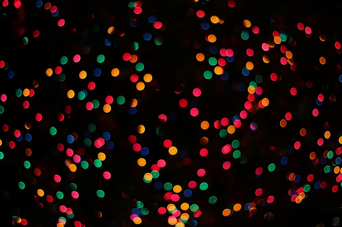 Bokeh lights texture of red, green, blue, and yellow.