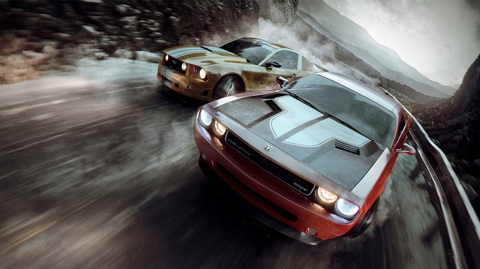 Dodge Challenger and Ford Mustang racing on a mountain road