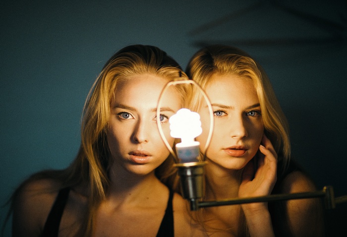 Two women and a light bulb