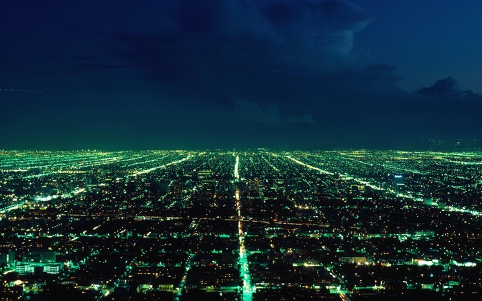 Cityscape at night with glowing lights