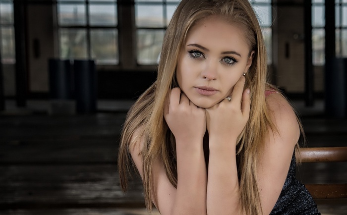 Portrait of a young woman with blonde hair