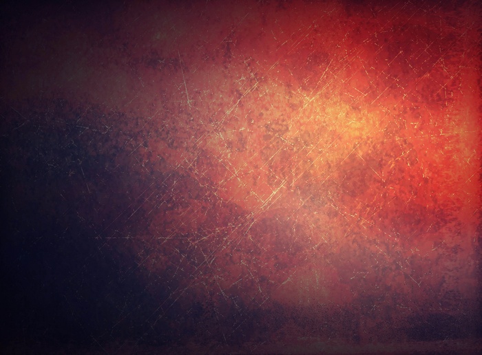 Red and orange textured background with scratches