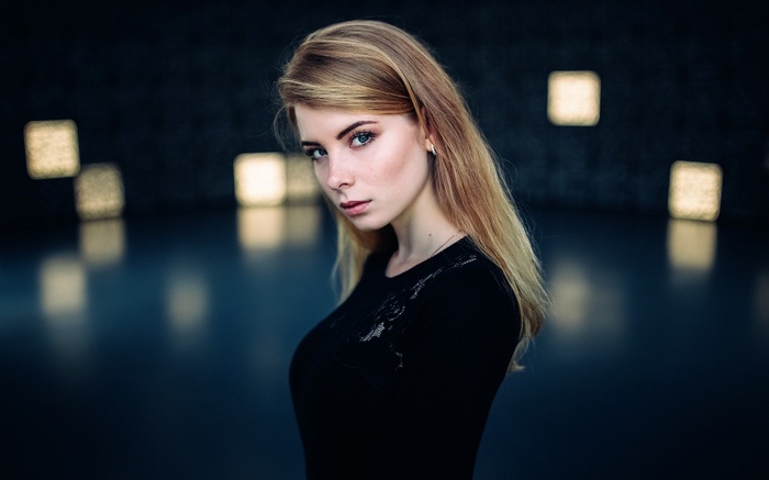 Irina Popova with blonde hair and blue eyes