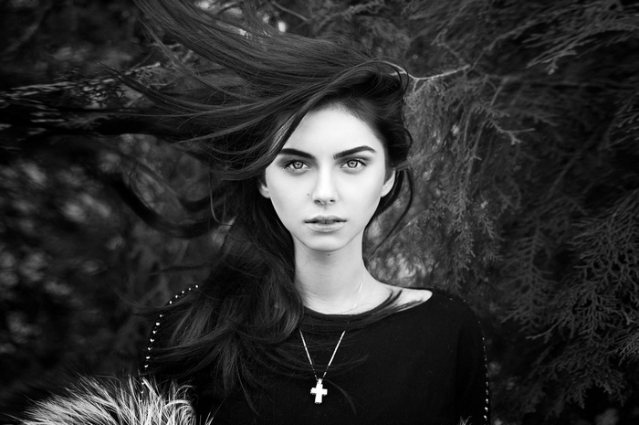 Monochrome portrait of a woman with flowing hair