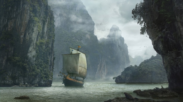 Sailing ship navigates through a misty bay with rocky cliffs