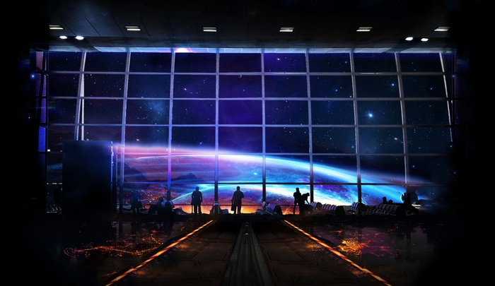 People looking out a window at a planet in space