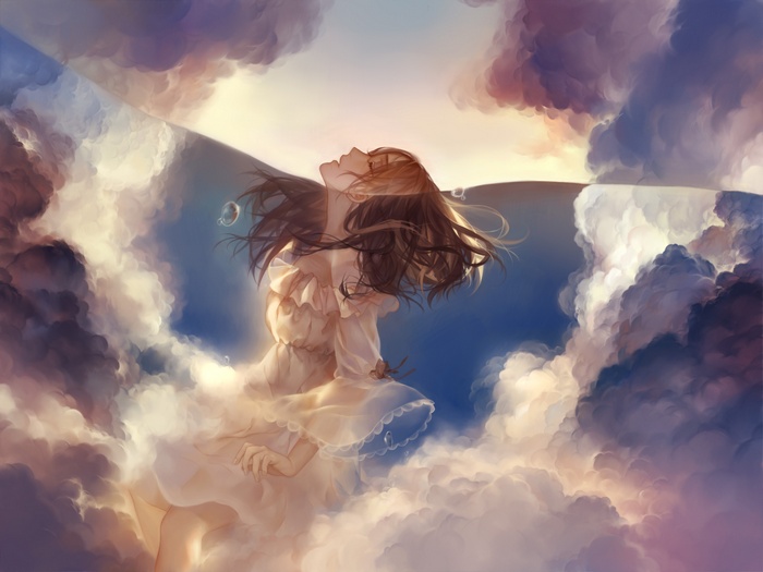 Girl in a dress floating in clouds