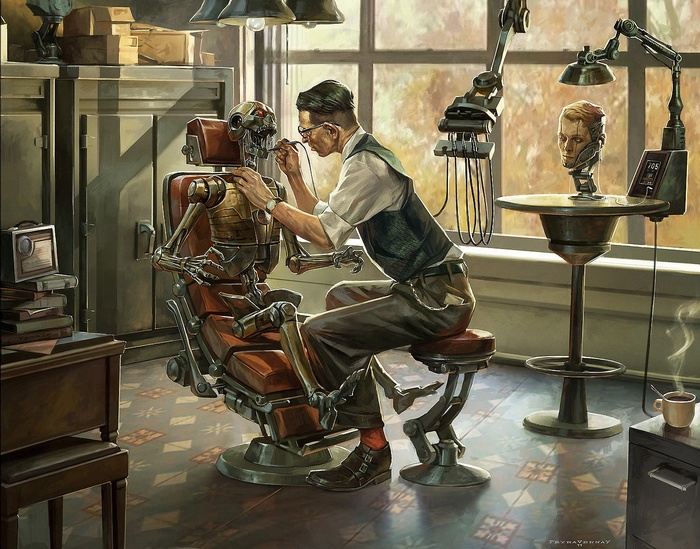 Man working on a robot in a workshop