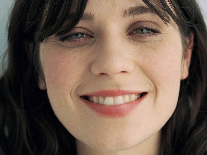 Close-up of Zooey Deschanel smiling