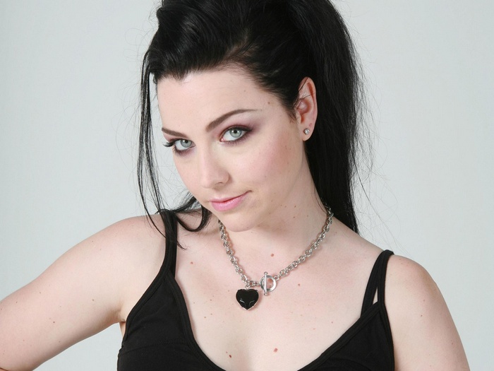 Amy Lee with a black heart necklace
