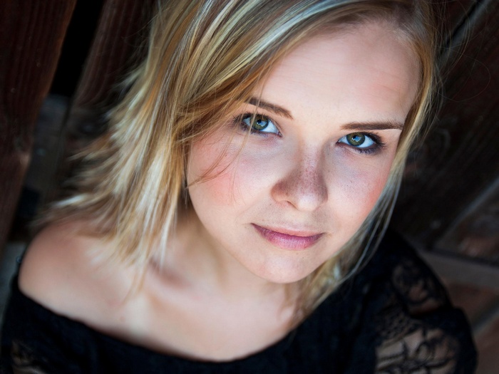 Portrait of a young woman with blonde hair