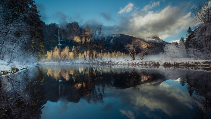 Winter reflection of Yosemite National Park with waterfall