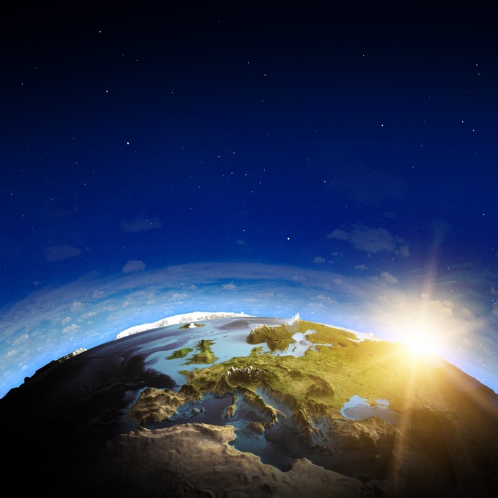 Earth from space with sunrise over Europe
