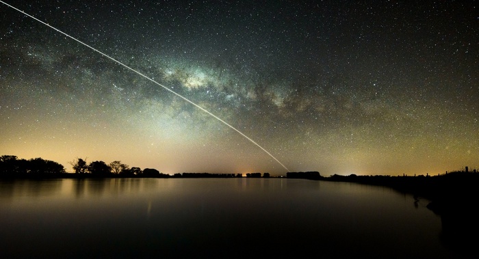 Milky Way galaxy over a lake at night