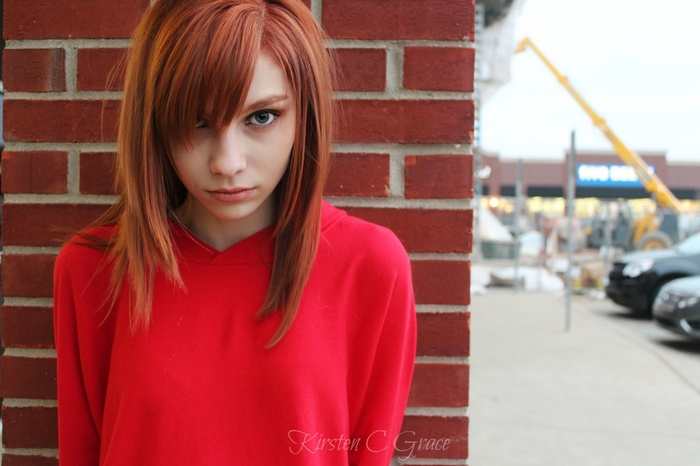 Redhead girl in red hoodie
