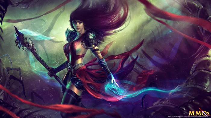 Woman with staff and magic in Guild Wars