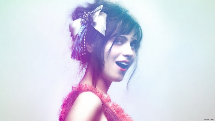 Zooey Deschanel with a bow in her hair