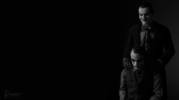 Two Jokers, one standing behind the other