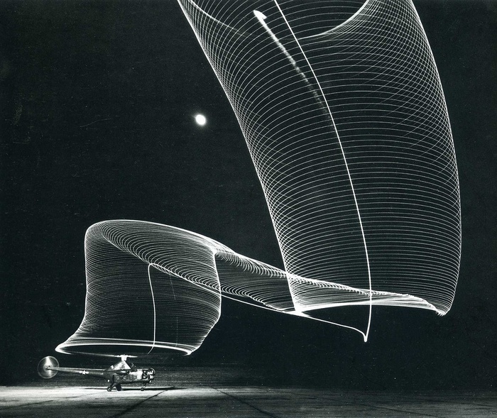 Helicopter light trails at night