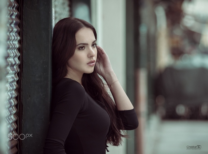 Portrait of a brunette woman with brown eyes