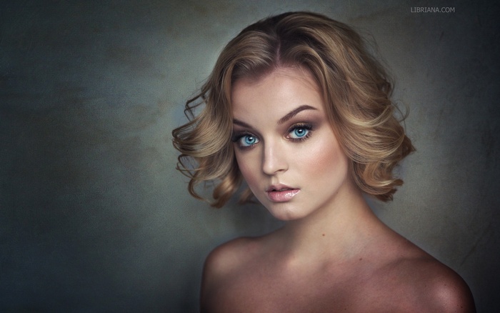 Portrait of a blonde woman with blue eyes