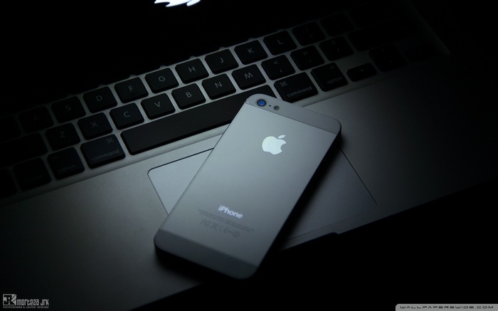 iPhone on a MacBook keyboard