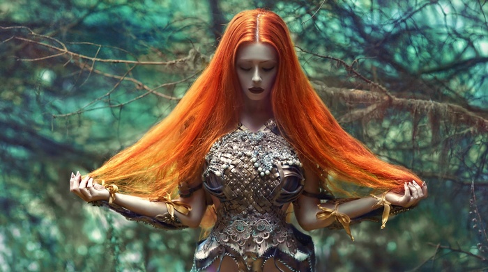 Fantasy art of a redhead woman by A. M. Lorek