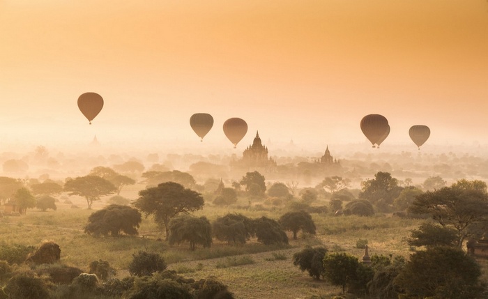 Hot air balloons over Bagan temples at sunrise
