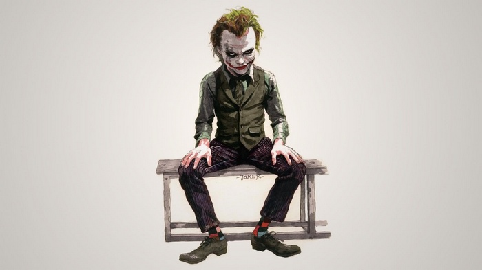 Heath Ledger's Joker sitting on a bench