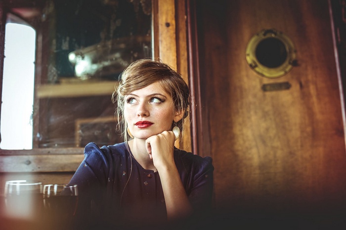 Woman with red lipstick and vintage hairstyle