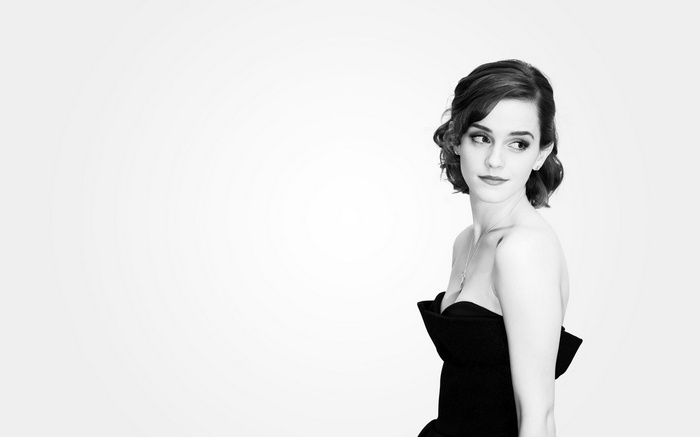 Emma Watson in a black strapless dress